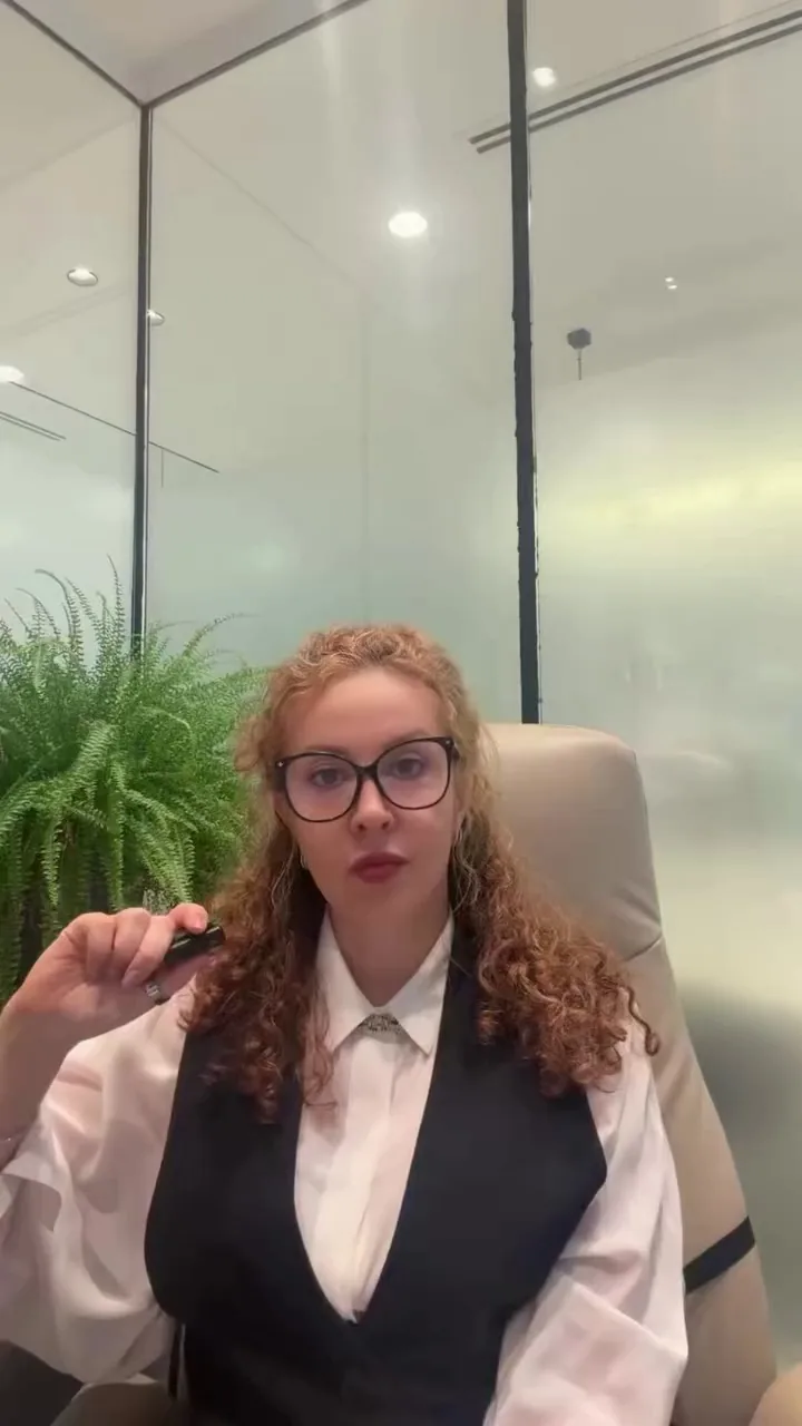Professional woman seated in an office, suggesting business support for UAE mainland company setup